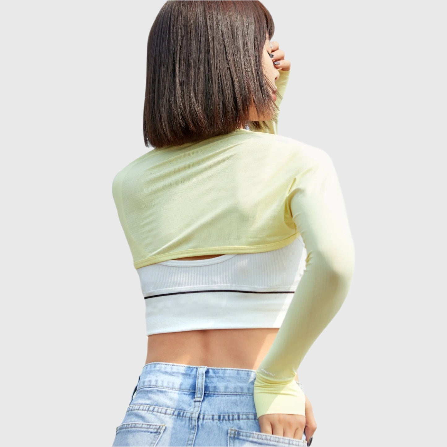 أكمام واقية من الشمس بدرجة حماية 50+ على الكتف